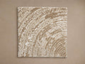Lette Hand-Knotted Rug Swatch showcasing a textured surface in beige and cream tones, forming abstract circular patterns.