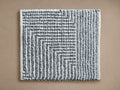 Maddux Performance Rug Swatch: Blue-grey and white textured geometric pattern with thick stripes, seen flat.