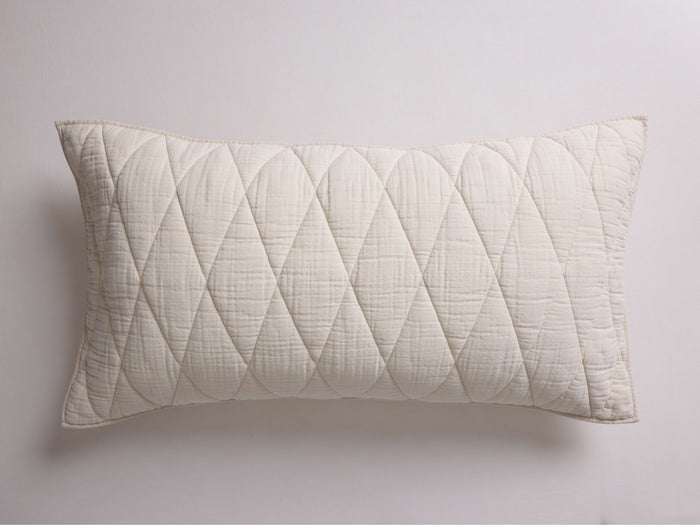 Horizontal Malea Cotton Sham in off-white, featuring a quilted diamond pattern, soft crinkled texture, and corded piping.