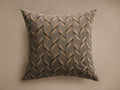 Square Matte Pillow featuring a textured abstract pattern of tan and dark grey feather-like shapes on a muted gray fabric.