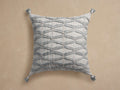 Mesa Outdoor Floor Pillow: Square, light gray with raised textured diamond pattern and tassels on each corner.