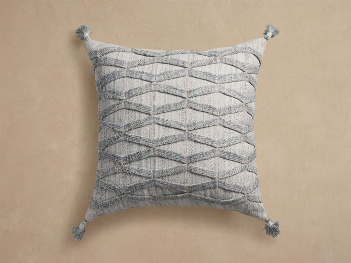 Mesa Outdoor Floor Pillow: Square, light gray with raised textured diamond pattern and tassels on each corner.