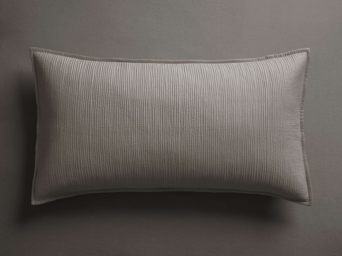 Light gray Mira Voile Sham, rectangular with textured vertical stitching & hemmed edges, resting on a dark gray surface.