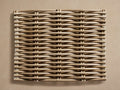 Montauk Outdoor Finish Board. A square panel of tightly woven light brown wicker, viewed from above on a beige surface.