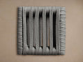 Naxos Outdoor Finish Board, a square board made of thick grey braided ropes forming vertical slats, on a beige background.