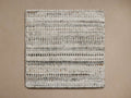 Nola Performance Rug Swatch in a square shape, displaying a textured weave with shades of gray and beige on a neutral background.