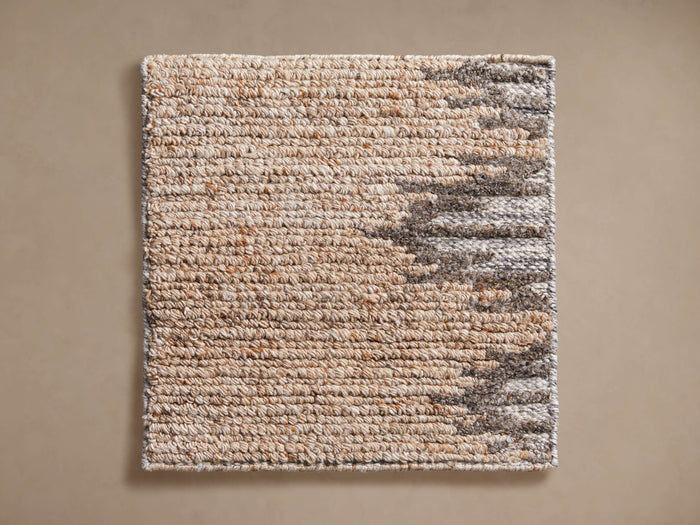 Raine Performance Rug Swatch: Square, natural beige woven texture with mottled grey and brown patterned stripes. Flat lay.