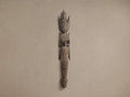 Rama Wall Sculpture, handcrafted dark wooden figure of a deity with headdress and clasped hands, mounted on a light wall.