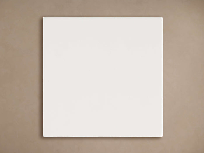 Rectangular Rowan Finish Board, a smooth white sample board centered on a muted brown background.