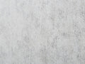 Shimmering Fields Wallpaper features a subtle mottled texture in light and dark gray with a metallic sheen, creating depth and movement.