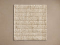 Rectangular Silo Rug Swatch with light beige natural woven texture and horizontal lines, laid flat on a muted brown background.