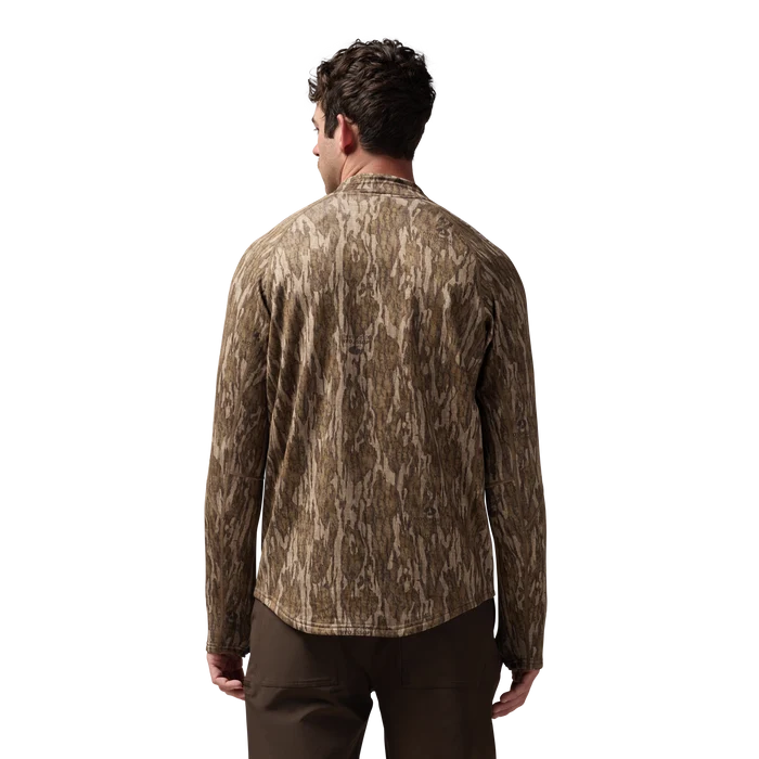 Sixty Series Technical Fleece Half Zip in Mossy Oak Bottomland, on model #mossy_oak_bottomland