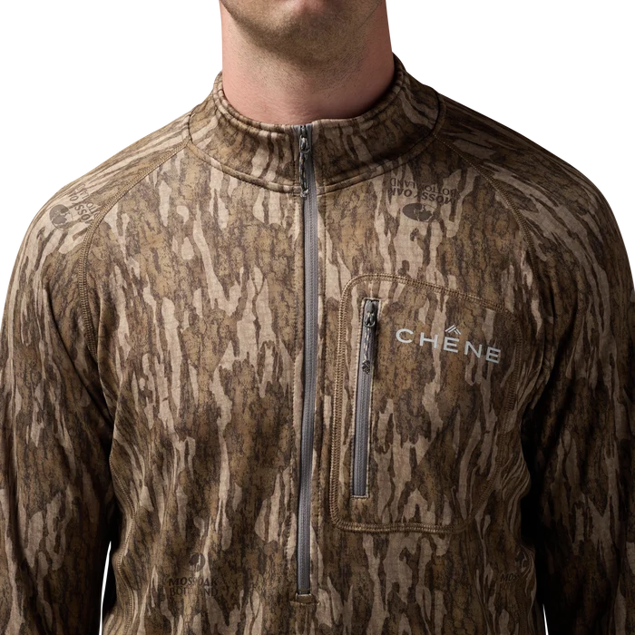 Sixty Series Technical Fleece Half Zip in Mossy Oak Bottomland, on model #mossy_oak_bottomland