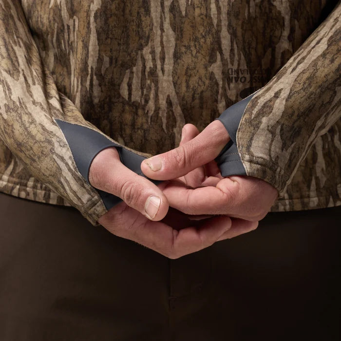 Sixty Series Technical Fleece Half Zip in Mossy Oak Bottomland, on model #mossy_oak_bottomland