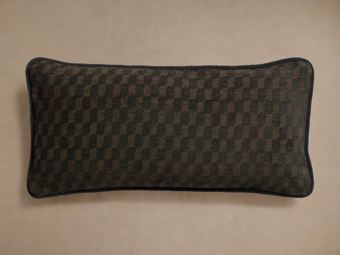 Soren Lumbar Pillow. Rectangular, dark green/brown textured checkerboard pattern with dark blue corded piping.