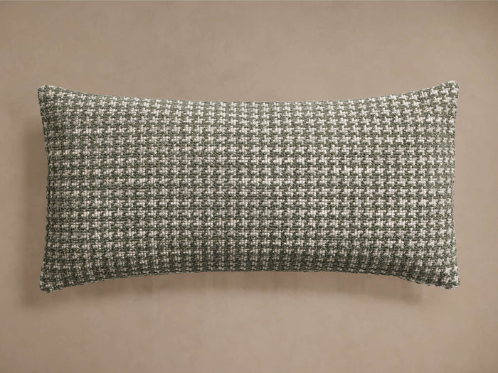 Horizontal Sorisole Lumbar Pillow featuring a dark green and off-white subtle houndstooth-inspired woven pattern.