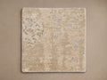 Tansey Hand-Knotted Rug in beige tones, showcasing subtle textures and a lightly patterned surface, square shape, on a plain background.