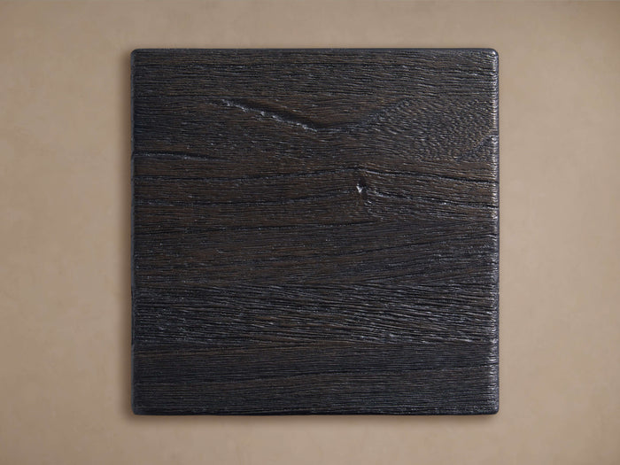 Square dark "Telegraph" finish board, prominent horizontal wood grain texture, slightly rustic, on a light brown background.