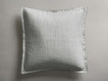 Tulaya Cotton Sham in light grey, featuring a square quilted texture and a 1-inch frayed edge, lying flat.