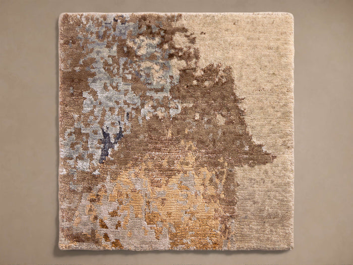 Square Vivianne Hand-Knotted Rug Swatch, abstract distressed pattern in beige, brown, light blue, and gold, centered.